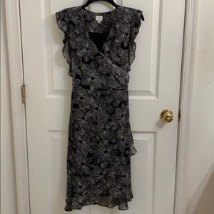 “A New Day”black dress with white print flowers